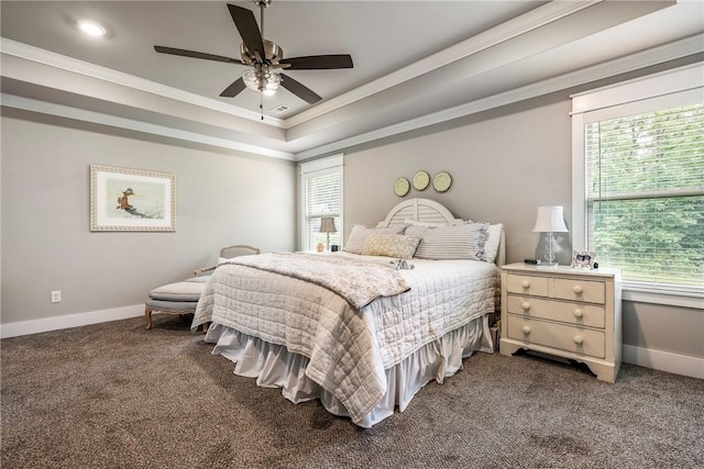 13 Ingleborough Dr, Bella Vista, AR 72715 - bedroom with ornamental molding, dark carpet, baseboards, a tray ceiling, and a ceiling fan
