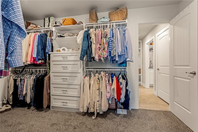 13 Ingleborough Dr, Bella Vista, AR 72715 - walk in closet with carpet floors