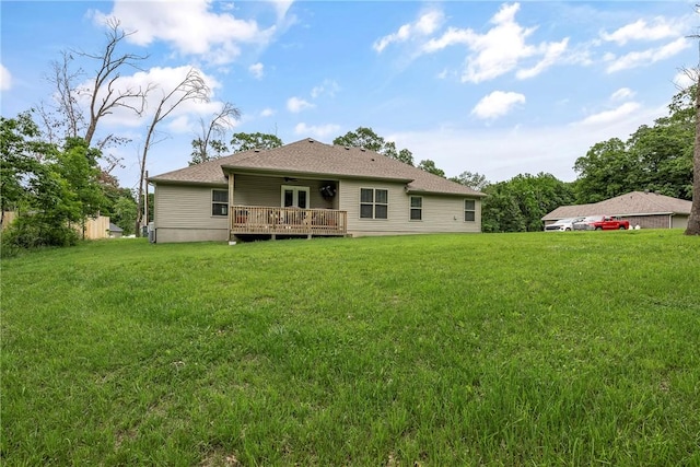 13 Ingleborough Dr, Bella Vista, AR 72715 - rear view of house featuring a lawn, a ceiling fan, and a wooden deck