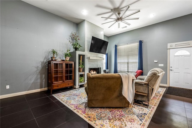 29 Kentallen Ln, Bella Vista, AR 72715 - living room with a ceiling fan, tile patterned floors, baseboards, and a fireplace