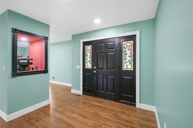 605 SW O St, Bentonville, AR 72712 - foyer featuring baseboards, wood finished floors, and recessed lighting