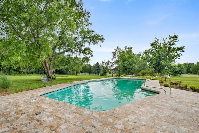 605 SW O St, Bentonville, AR 72712 - outdoor pool with a patio area, a yard, and view of wooded area