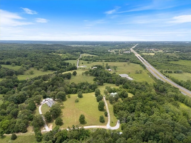 17171 Kincheloe Rd, Siloam Springs, AR 72761 - aerial view of property and surrounding area featuring a heavily wooded area