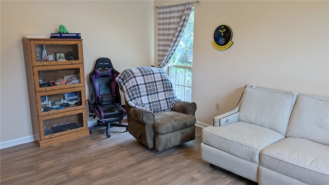 2560 Jayme Cir, Conway, AR 72032 - living area featuring wood finished floors and baseboards