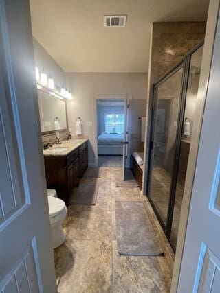 10211 Lydia Ln, Danville, AR 72833 - full bathroom featuring vanity, a shower stall, and toilet