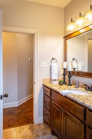 10211 Lydia Ln, Danville, AR 72833 - bathroom featuring vanity and baseboards
