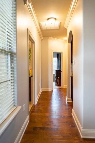 10211 Lydia Ln, Danville, AR 72833 - corridor featuring crown molding, arched walkways, wood finished floors, and baseboards