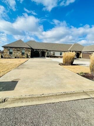 10211 Lydia Ln, Danville, AR 72833 - view of front of property featuring driveway and stone siding
