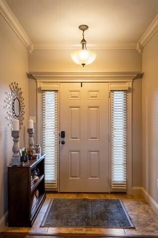10211 Lydia Ln, Danville, AR 72833 - foyer entrance with crown molding and baseboards
