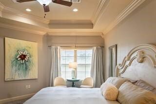10211 Lydia Ln, Danville, AR 72833 - bedroom with crown molding, a tray ceiling, recessed lighting, a ceiling fan, and baseboards
