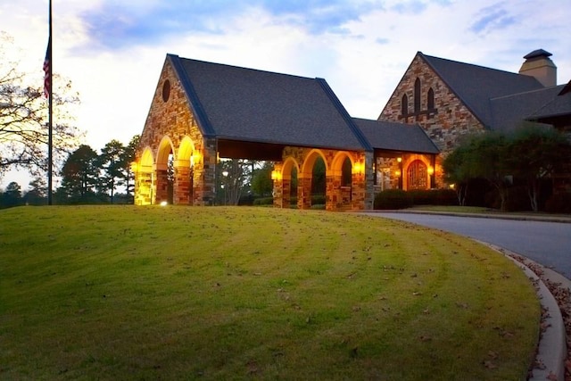 10211 Lydia Ln, Danville, AR 72833 - english style home featuring stone siding and a front lawn