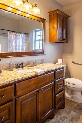 10211 Lydia Ln, Danville, AR 72833 - full bath with vanity, toilet, and curtained shower
