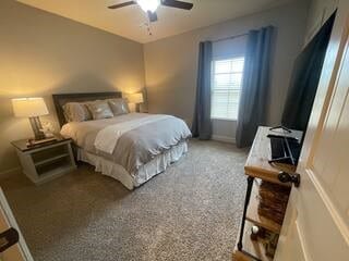10211 Lydia Ln, Danville, AR 72833 - bedroom with carpet, ceiling fan, and baseboards