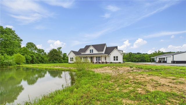 14290 Osage Creek Rd, Springdale, AR 72762 - view of front of property with a water view and a garage
