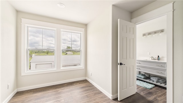 14290 Osage Creek Rd, Springdale, AR 72762 - hall featuring wood finished floors and baseboards