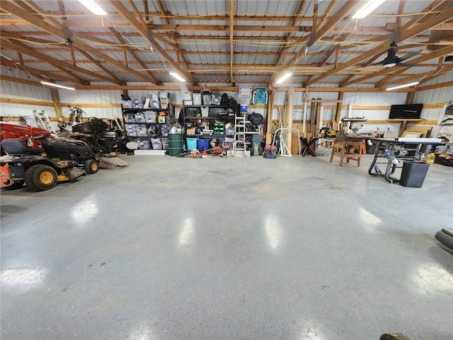 14290 Osage Creek Rd, Springdale, AR 72762 - garage with a ceiling fan and a workshop area