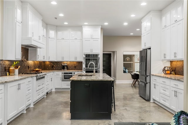 3634 Sugarberry Ln, Springdale, AR 72764 - kitchen featuring stainless steel appliances, finished concrete flooring, recessed lighting, backsplash, and white cabinets