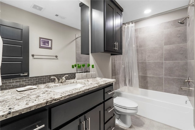 3634 Sugarberry Ln, Springdale, AR 72764 - bathroom with vanity, shower / bath combo, tile patterned floors, toilet, and tasteful backsplash
