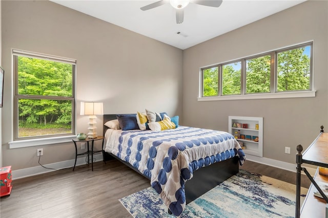 3634 Sugarberry Ln, Springdale, AR 72764 - bedroom featuring multiple windows, baseboards, and wood finished floors