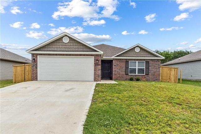 2409 S Silver St, Siloam Springs, AR 72761 - ranch-style home with brick siding, a garage, and concrete driveway