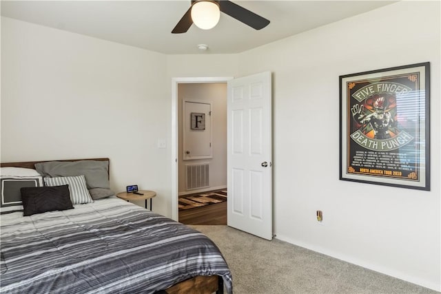 2409 S Silver St, Siloam Springs, AR 72761 - bedroom with light carpet and a ceiling fan