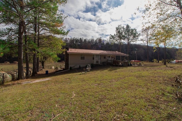 817 Madison 8610, Huntsville, AR 72740 - view of grassy yard with a deck and view of scattered trees