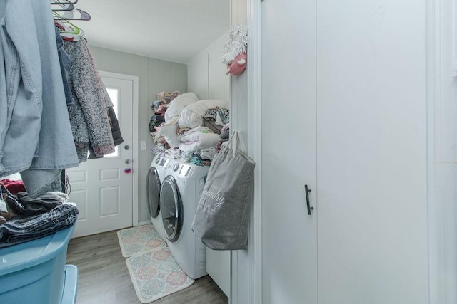 817 Madison 8610, Huntsville, AR 72740 - laundry room featuring washer and dryer and light wood-style floors