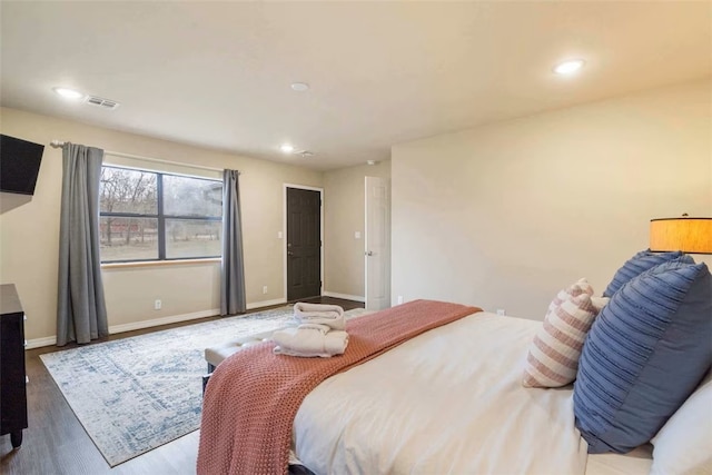 4933 Rocky Ridge Trl, Little Flock, AR 72756 - bedroom with recessed lighting, wood finished floors, and baseboards