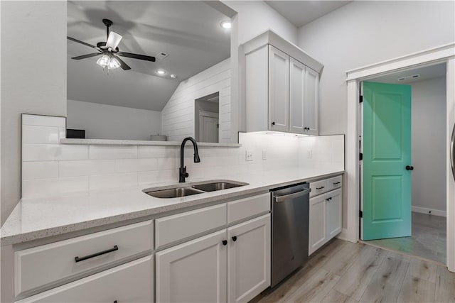 8 Grantham Dr, Bella Vista, AR 72714 - kitchen featuring stainless steel dishwasher, a sink, a ceiling fan, light wood finished floors, and decorative backsplash