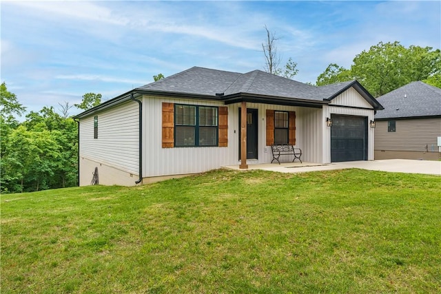 8 Grantham Dr, Bella Vista, AR 72714 - view of front of home with a garage, concrete driveway, a front lawn, and a porch