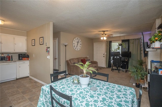 1627 W Hefley St, Fayetteville, AR 72703 - dining room featuring a ceiling fan, a textured ceiling, and an office area