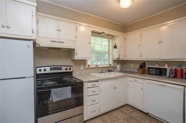 1627 W Hefley St, Fayetteville, AR 72703 - kitchen featuring white appliances, under cabinet range hood, a sink, a textured ceiling, and light countertops