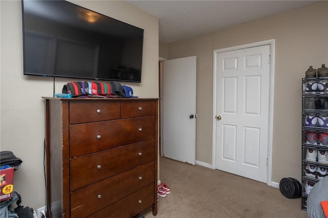 1627 W Hefley St, Fayetteville, AR 72703 - bedroom featuring light colored carpet and baseboards