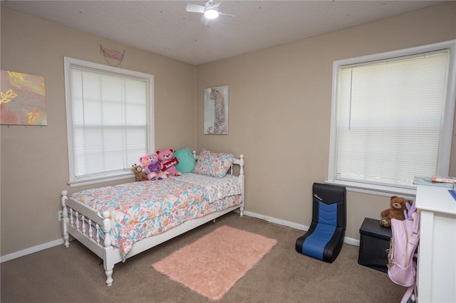 1627 W Hefley St, Fayetteville, AR 72703 - bedroom with carpet flooring, baseboards, and ceiling fan