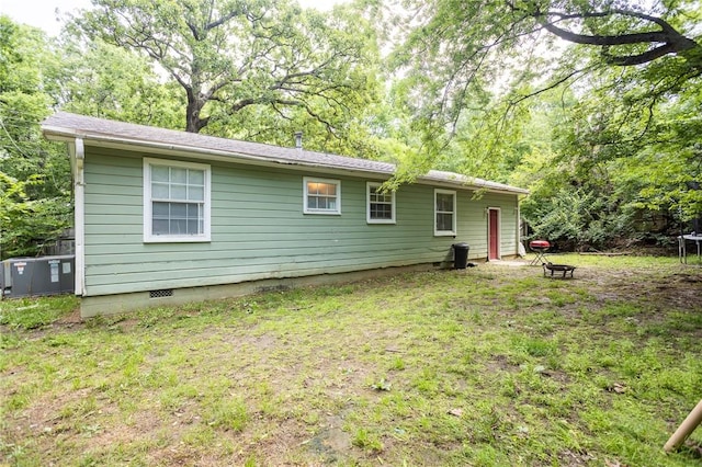 1627 W Hefley St, Fayetteville, AR 72703 - back of house featuring crawl space and central AC
