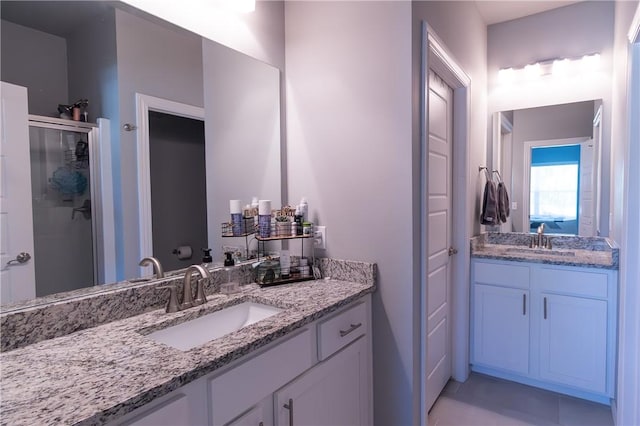5803 SW Gentle Winds Ave, Bentonville, AR 72713 - bathroom with a stall shower and vanity