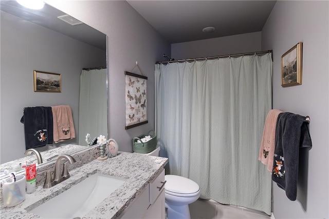 5803 SW Gentle Winds Ave, Bentonville, AR 72713 - full bathroom with vanity, toilet, and curtained shower