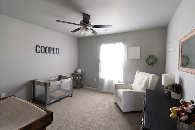 5803 SW Gentle Winds Ave, Bentonville, AR 72713 - living area with a ceiling fan and carpet floors