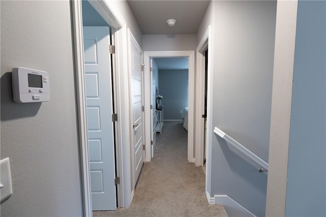 5803 SW Gentle Winds Ave, Bentonville, AR 72713 - corridor featuring an upstairs landing and light carpet
