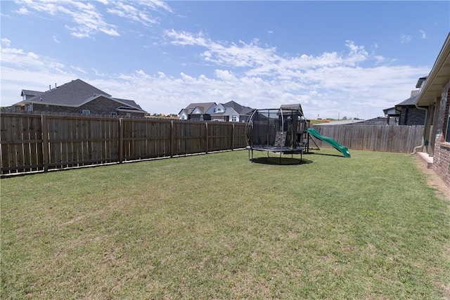 5803 SW Gentle Winds Ave, Bentonville, AR 72713 - view of yard with a playground, a trampoline, and a residential view