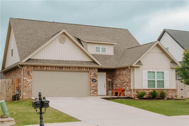 5803 SW Gentle Winds Ave, Bentonville, AR 72713 - craftsman house featuring brick siding, board and batten siding, concrete driveway, a shingled roof, and an attached garage