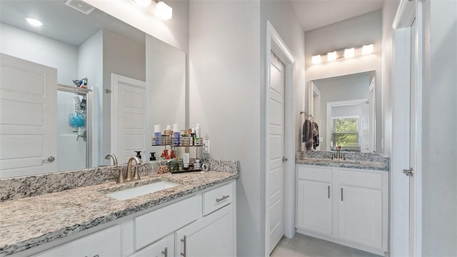 5803 SW Gentle Winds Ave, Bentonville, AR 72713 - full bathroom with vanity and tile patterned floors