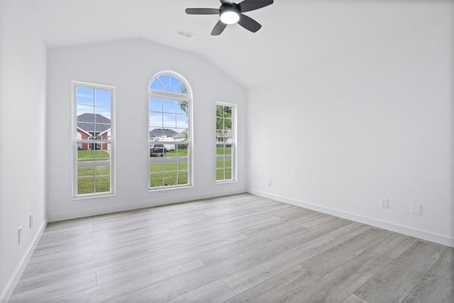 119 Elm St, Centerton, AR 72719 - unfurnished room with ceiling fan, lofted ceiling, wood finished floors, and baseboards
