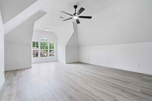 119 Elm St, Centerton, AR 72719 - additional living space with ceiling fan, wood finished floors, vaulted ceiling, and baseboards