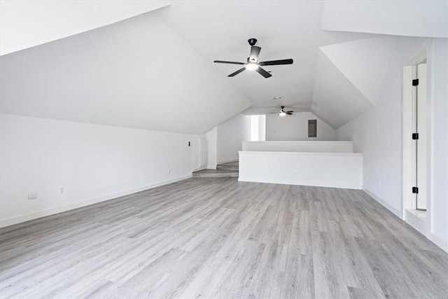 119 Elm St, Centerton, AR 72719 - additional living space featuring ceiling fan, light wood-style floors, lofted ceiling, and baseboards