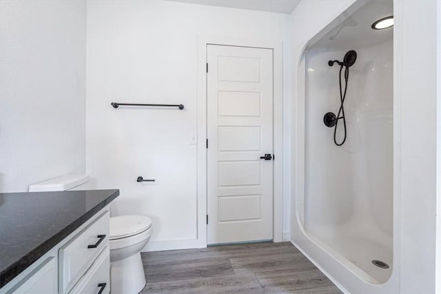 119 Elm St, Centerton, AR 72719 - full bath with vanity, a shower, wood finished floors, and toilet