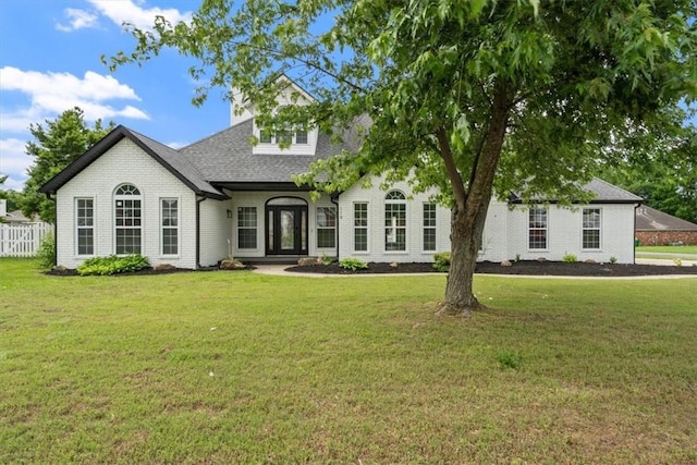 119 Elm St, Centerton, AR 72719 - view of front of property featuring a front yard and roof with shingles
