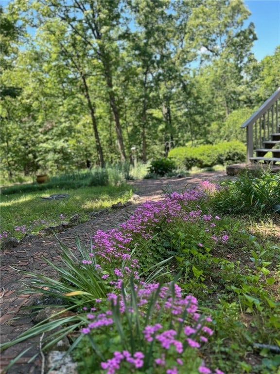 37 Retford Dr, Bella Vista, AR 72715 - view of yard featuring stairway