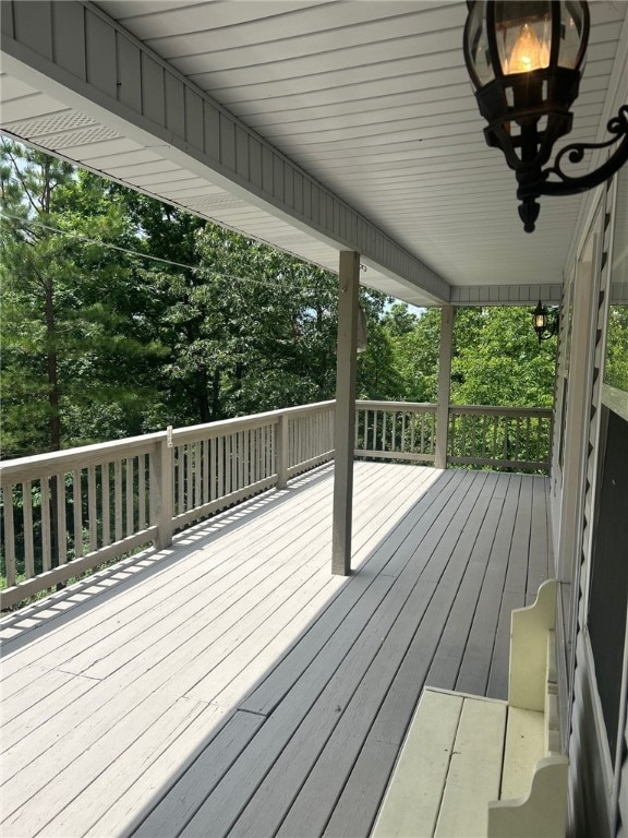 37 Retford Dr, Bella Vista, AR 72715 - wooden terrace with view of scattered trees