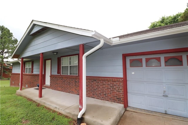 3064 Brandy Ln, Springdale, AR 72762 - view of front of home featuring brick siding, covered porch, and an attached garage